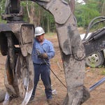 Image for episode "Money Pit" from Documentary programme "Swamp Loggers"